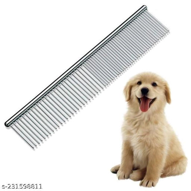 Multicolor stainless steel pet grooming comb resting on a pet bed, ideal for grooming dogs and cats.