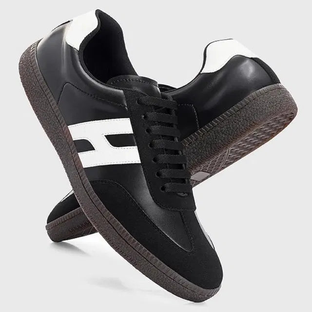 Anjrs Men's casual sports shoes in black, comfortable running style for boys and men, with breathable design and athletic sole.