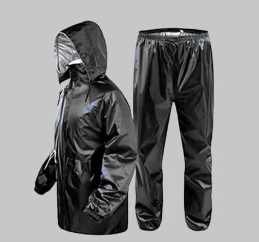 Black polyester solid rainsuit for men, size L, durable raincoat with hood and full-length sleeves, waterproof raingear by 18594.