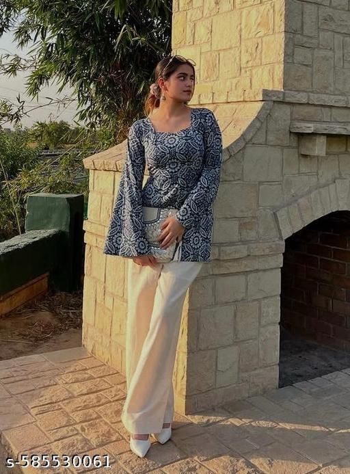 Printed girls kurti from 13374, stylish and trendy, featuring vibrant patterns and comfortable fabric for girls and women.