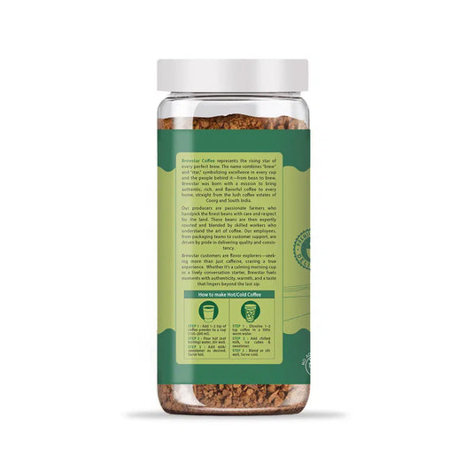 Brewstar Cardamom Coffee in a coffee pot, featuring aromatic coffee beans and a traditional brewing setup.
