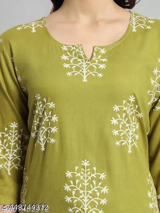Printed green rayon short kurti for girls and women, casual women's kurti with floral pattern and comfortable fit.