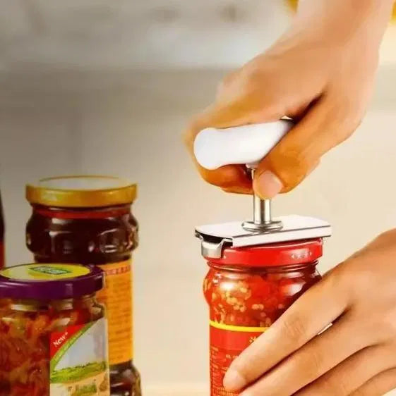 Manual can opener with bottle lid opener feature, branded 4485, stainless steel handle, and ergonomic design for easy use.