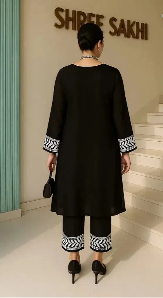 Women's Kurta set with matching bottomwear from 15801, featuring a stylish kurta with intricate designs and comfortable bottoms.