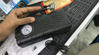 Portable 1238 air compressor tire inflator with digital display and hose for quick, easy tire inflation.