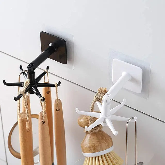 Wall-mounted adjustable degree hook for hookahs, featuring a sticker design by 31446, shown attached on a surface.