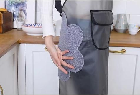 Adjustable transparent cooking apron from 30618, waterproof and oil-proof, with adjustable straps and clear plastic design.