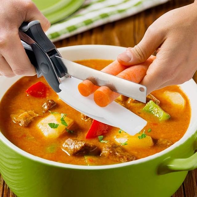 Clever Cutter 2-in-1 Food Chopper with integrated grater and slicer, compact kitchen tool for quick food preparation.