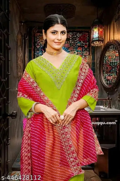 Women's kurta set with matching dupatta and bottomwear from brand 15801, featuring traditional design and vibrant fabric.