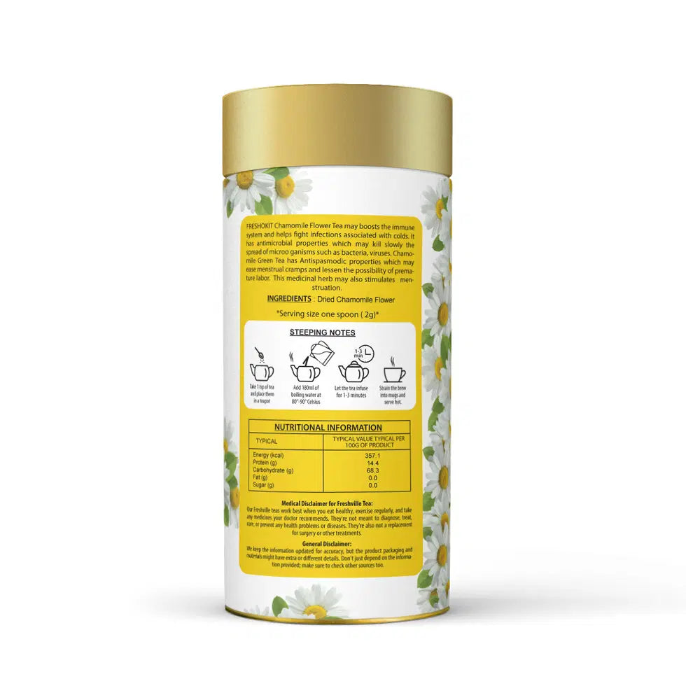Freshville Chamomile Tea in a classic tea pot, showcasing the relaxing herbal tea with chamomile flowers and a cozy setting