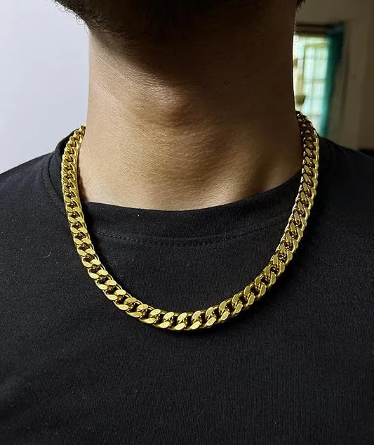 Heavy gold plated Cuban link chain for men and boys, showcasing a thick, shiny men's chain jewelry with a secure clasp.