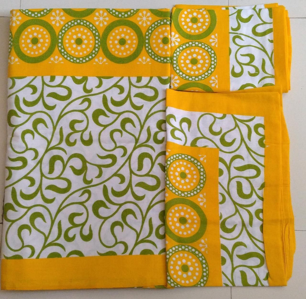Cotton printed double bedsheet with floral design from Drpshippr, featuring vibrant colors and intricate patterns.