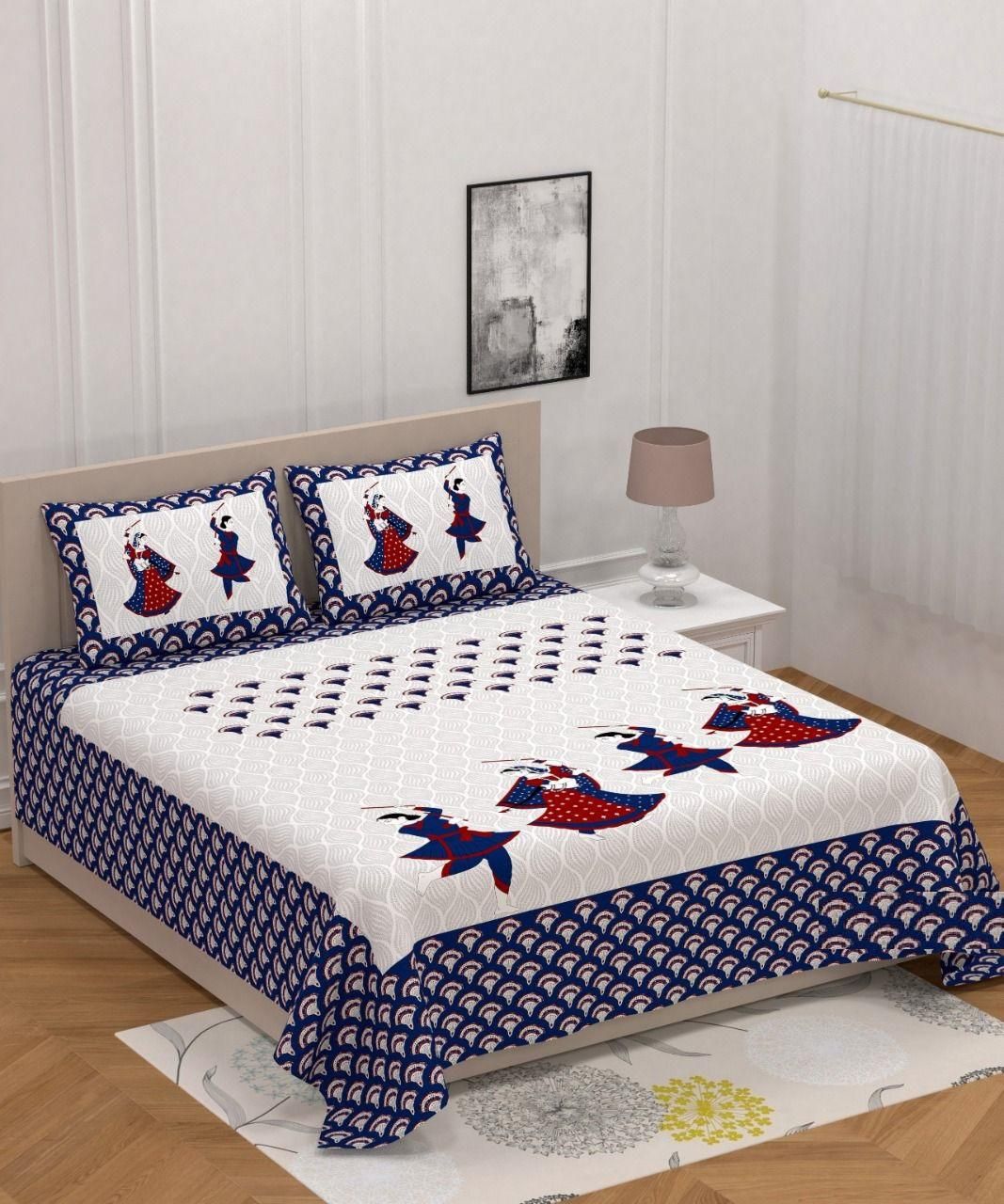 Cotton printed king size double bedsheet with colorful floral design, crafted by Drpshippr, shown on a neatly made bed.