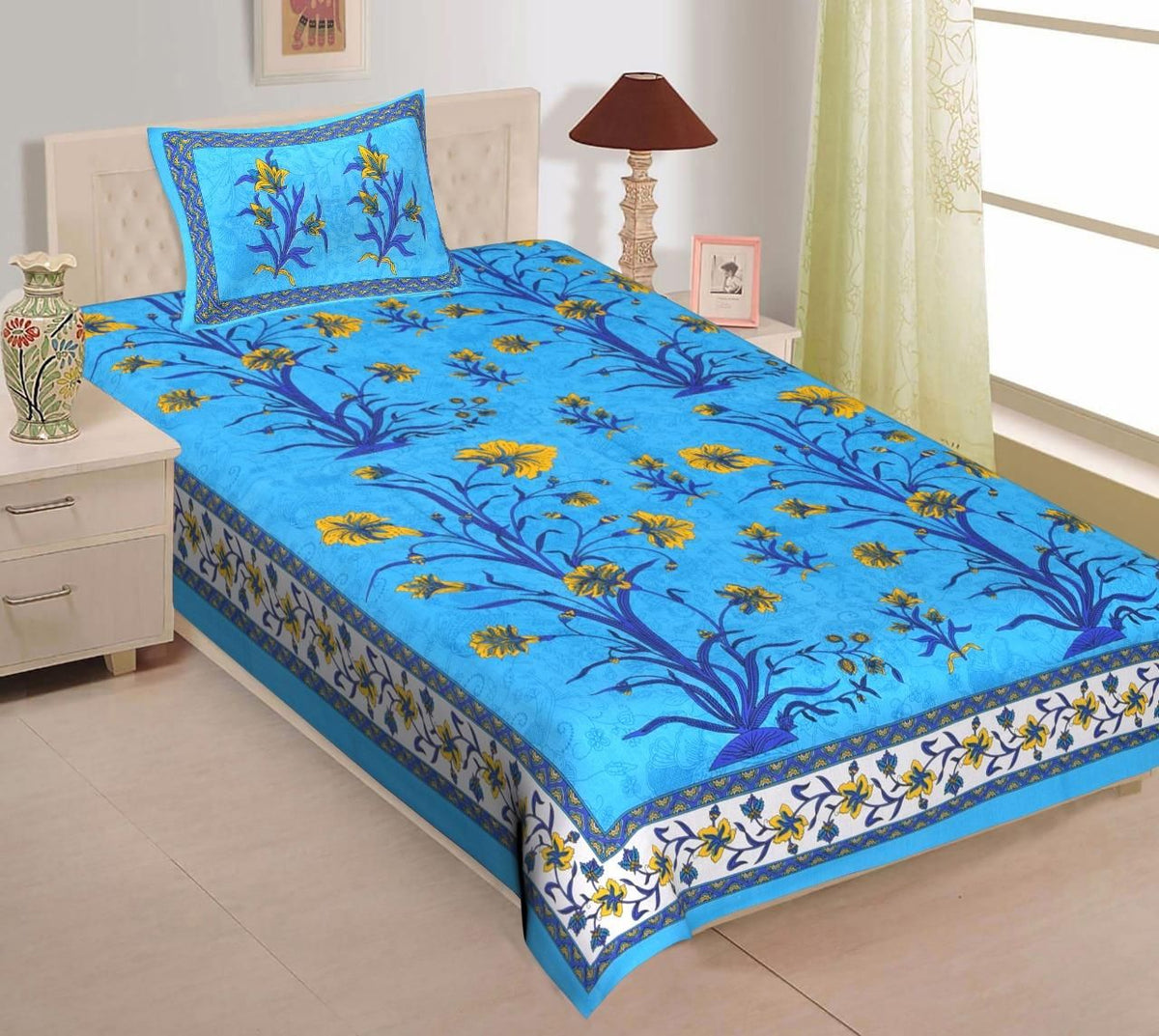 Cotton printed single bedsheet from Drpshippr with colorful floral design, lightweight and soft fabric for comfortable sleep.