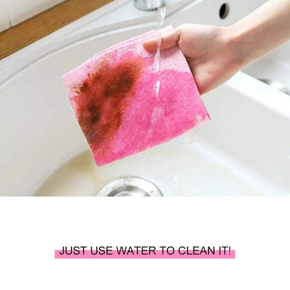 Two Wukusy super absorbent cleaning cloths, lightweight and soft, ideal for quick and effective surface cleaning in household use.