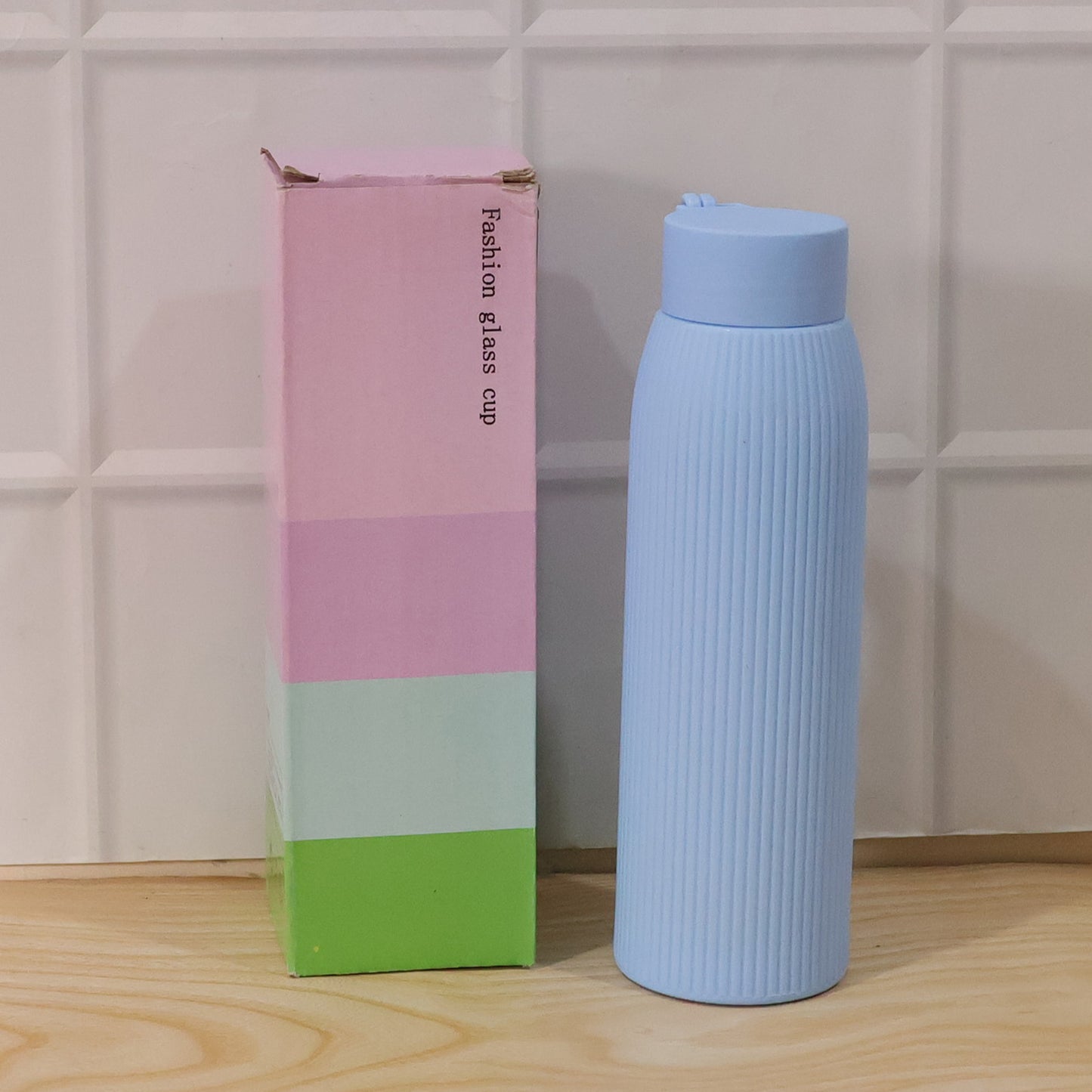 Wukusy premium textured glass water bottle, 300ml, featuring a sleek design and durable glass construction.