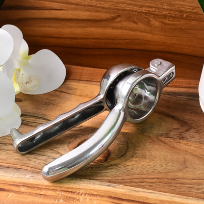Wukusy Supermom Aluminum Lemon Squeezer showing a close-up of the handheld kitchen tool for fresh lemon juice extraction