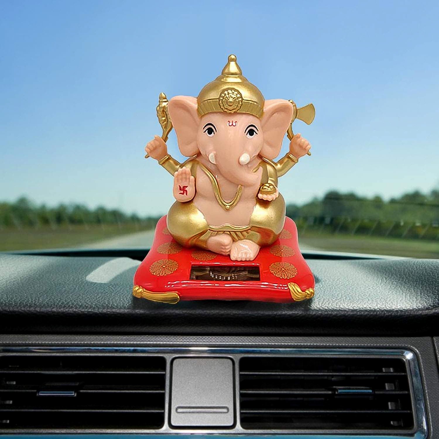 Decorative medium Lord Ganesh idol statue with solar-powered base, ideal for home decor, by Wukusy.