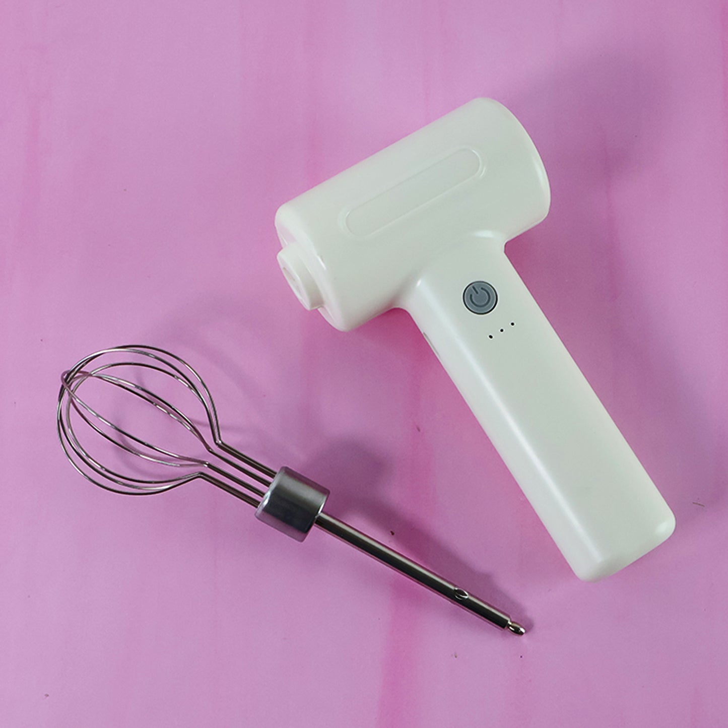 Wukusy cordless electric whisk and egg beater with stainless steel beaters on a white background