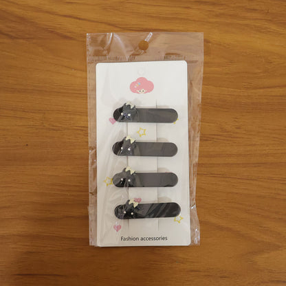 Set of four cute cat design Wukusy premium matte finish hair clips, perfect for stylish and functional hair accessories.