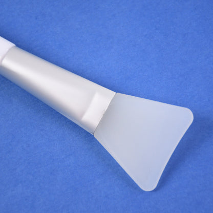 Wukusy silicone face mask applicator brush for smooth, even application of skincare masks in a health and beauty setting.