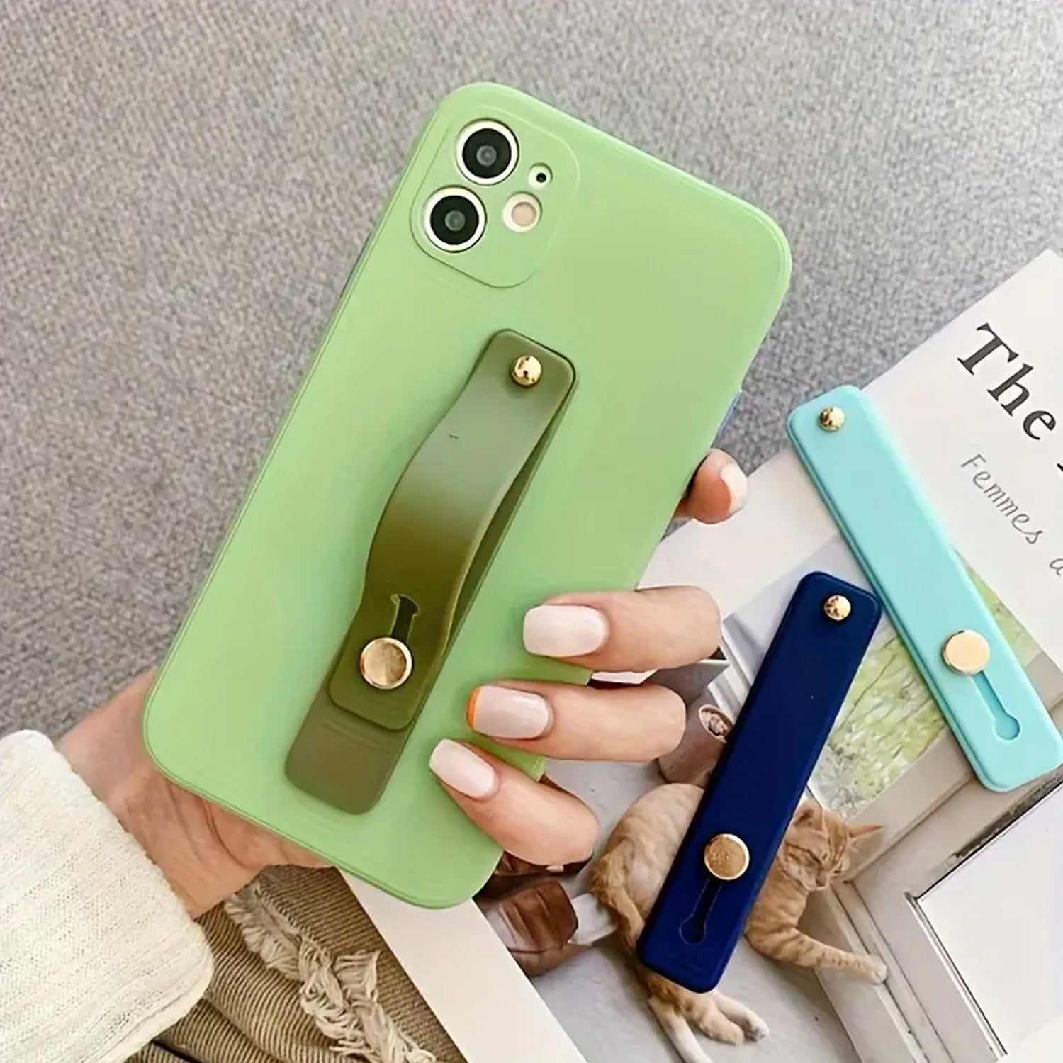 Silicone phone finger strap grip by Wukusy, flexible and secure for holding smartphones comfortably with a loop strap.