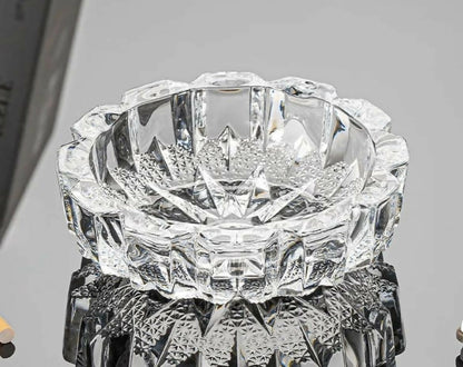 Wukusy crystal glass round ashtray with heavy-duty design and cigarette holder, featuring a clear, polished surface.