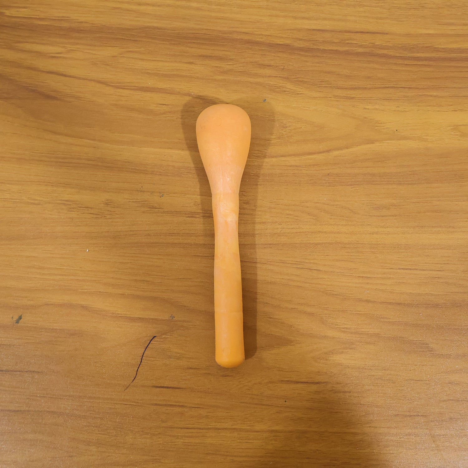Wukusy manual masher grinder tool for kitchen use, with stainless steel handle and textured mashing surface for efficient food preparation.
