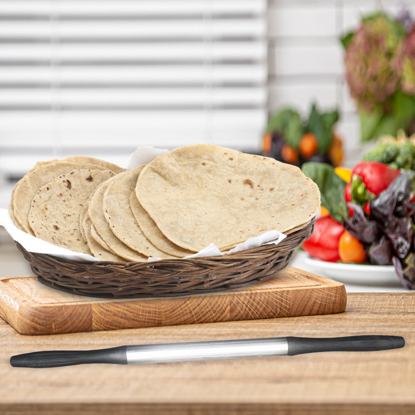 Black Wukusy 2520 Kitchen Plastic Belan rolling pin for baking and cooking, with a smooth handle and durable plastic body.