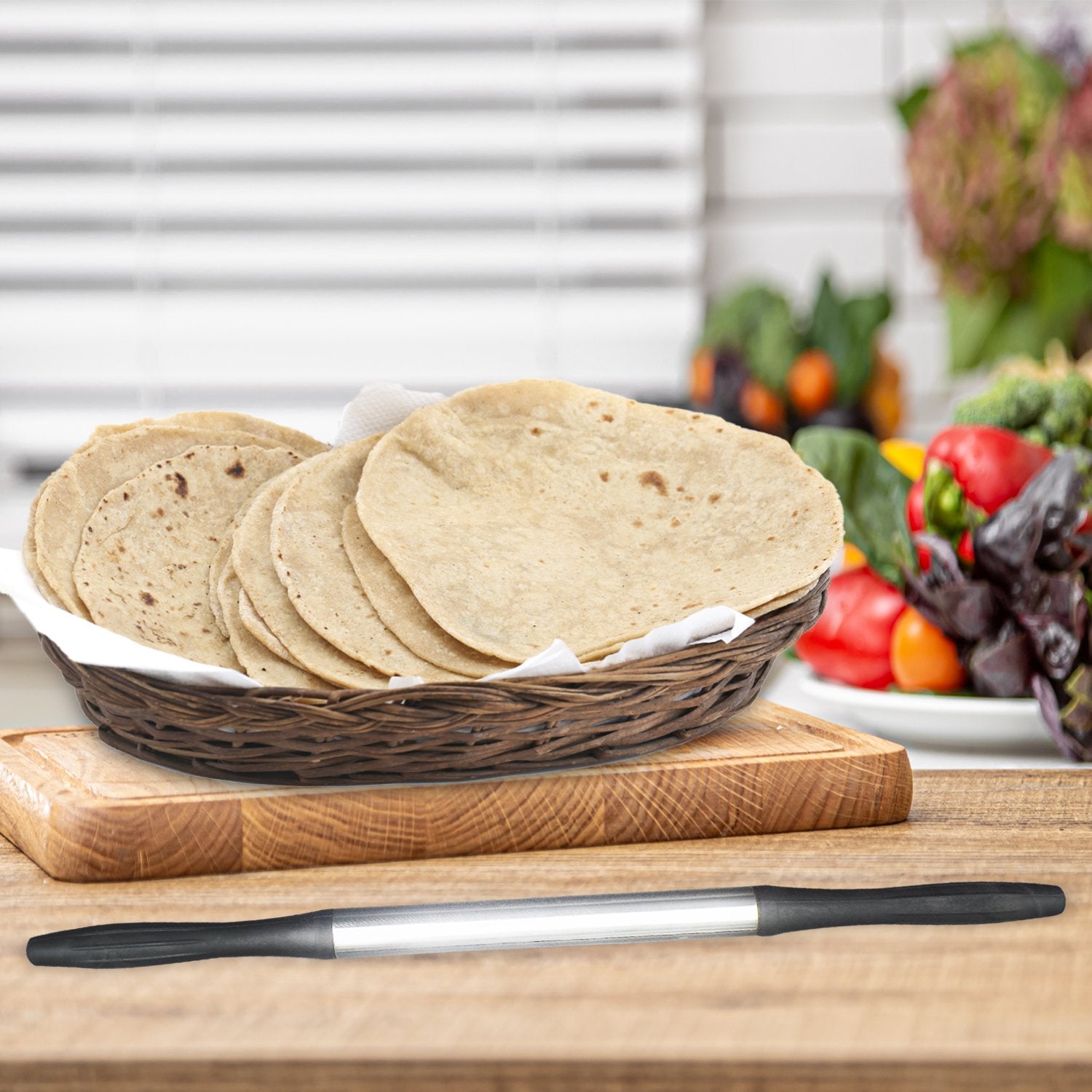 Black Wukusy 2520 Kitchen Plastic Belan rolling pin for baking and cooking, with a smooth handle and durable plastic body.