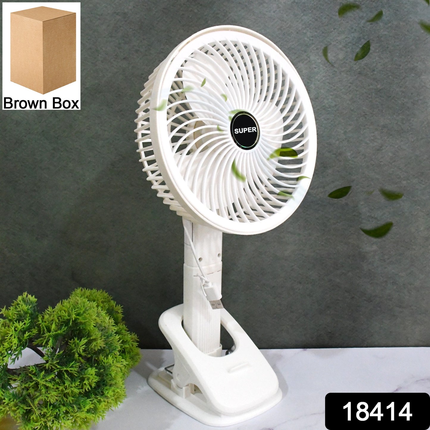 Wukusy multifunctional USB desk fan clipped onto a surface, compact home improvement cooling device with brown box packaging.