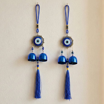 Decorative Wukusy Evil Eye hanging wind chime set with blue and white beads and charms, ideal for home decor and good luck.