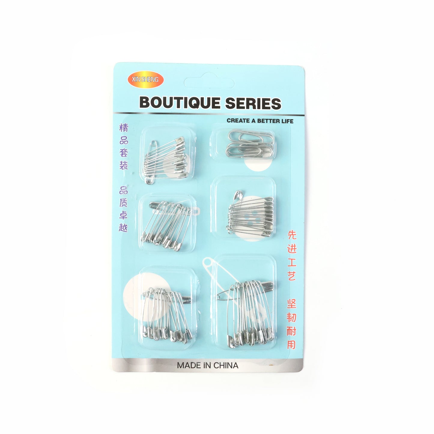 Assorted Wukusy metal safety pins in various sizes displayed in a set on a white background for versatile use.