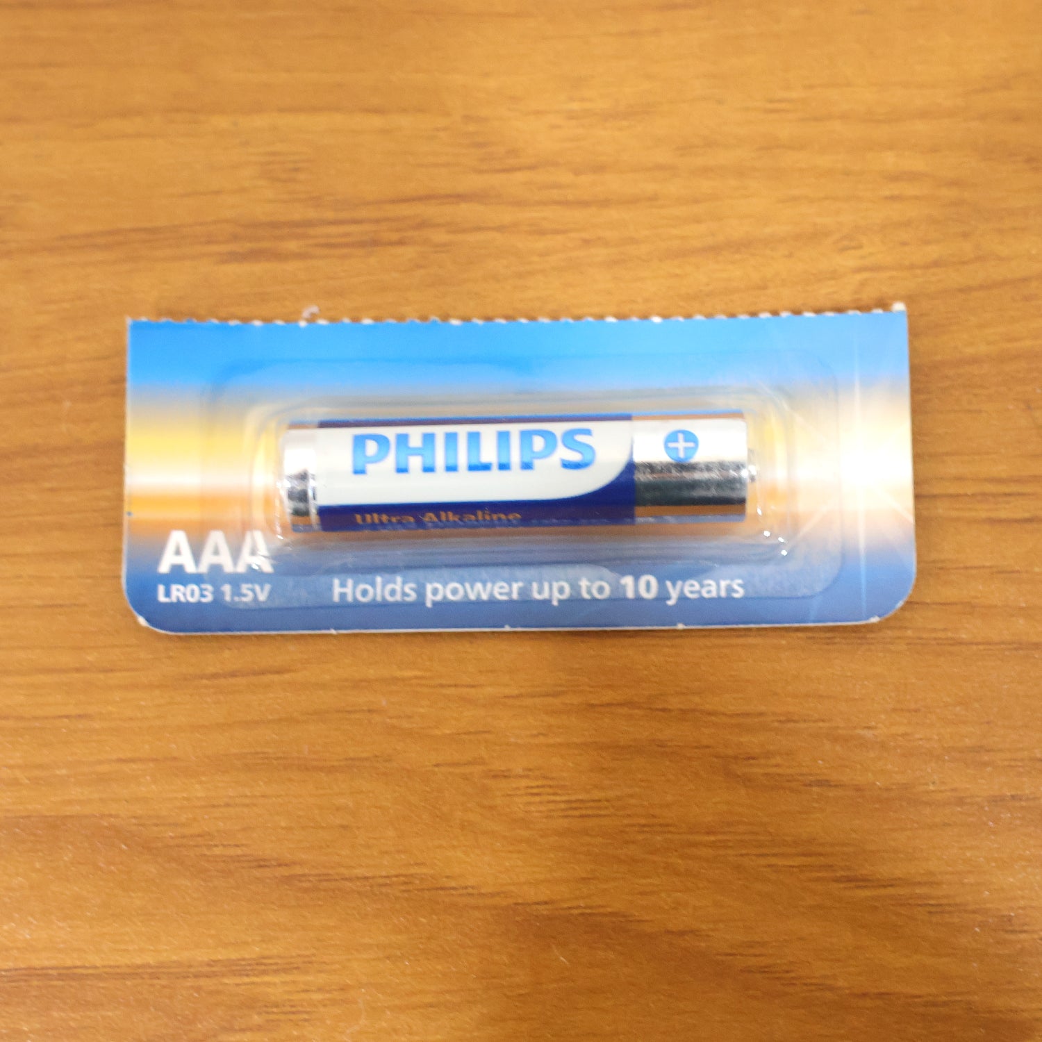 Wukusy AAA Ultra Alkaline Battery showing the brand name and battery specifications on the packaging.