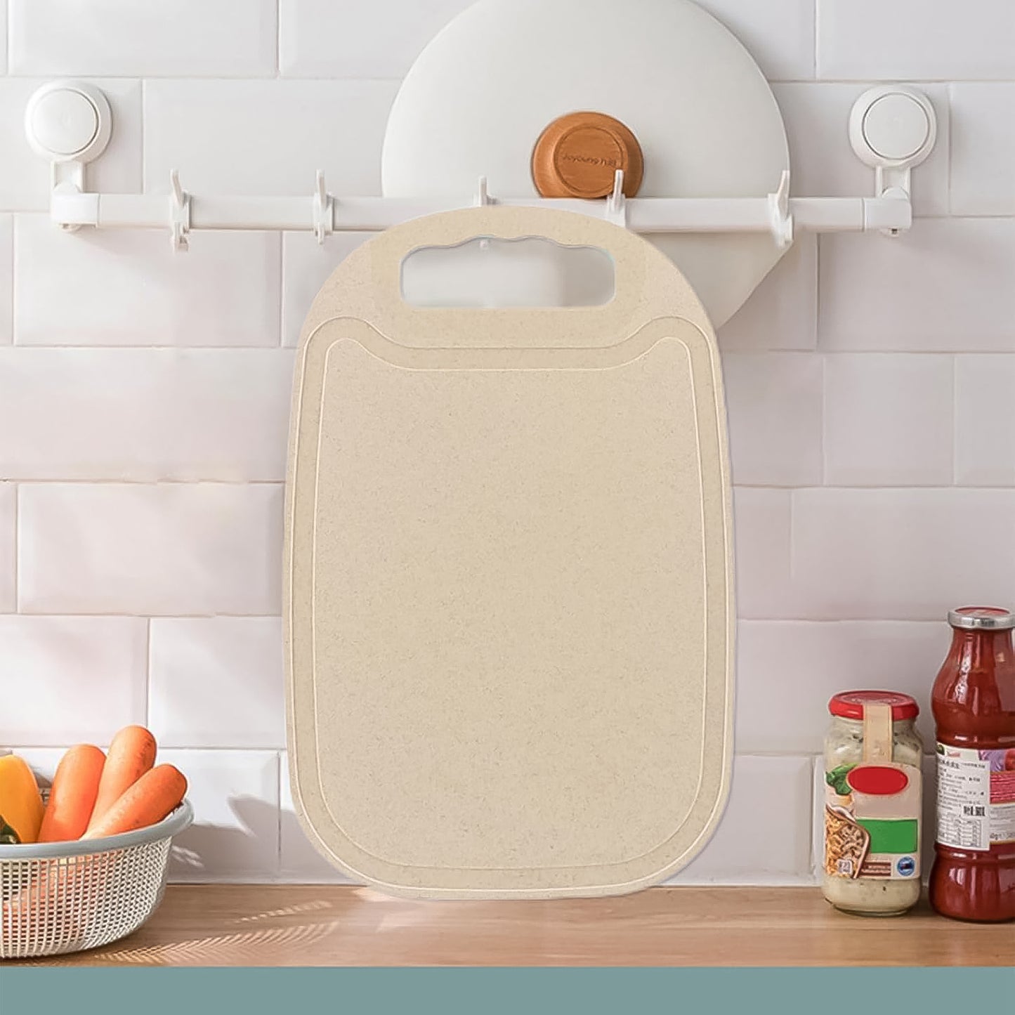 Wukusy durable plastic chopping board measuring 34x23 cm, ideal for kitchen food prep with a sturdy surface.