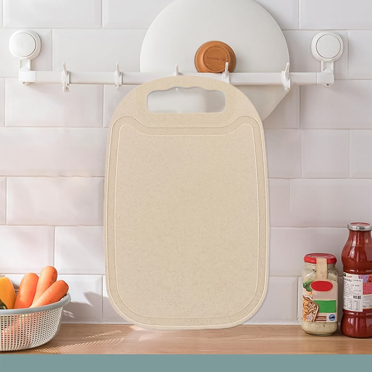 Wukusy durable plastic chopping board measuring 34x23 cm, ideal for kitchen food prep with a sturdy surface.