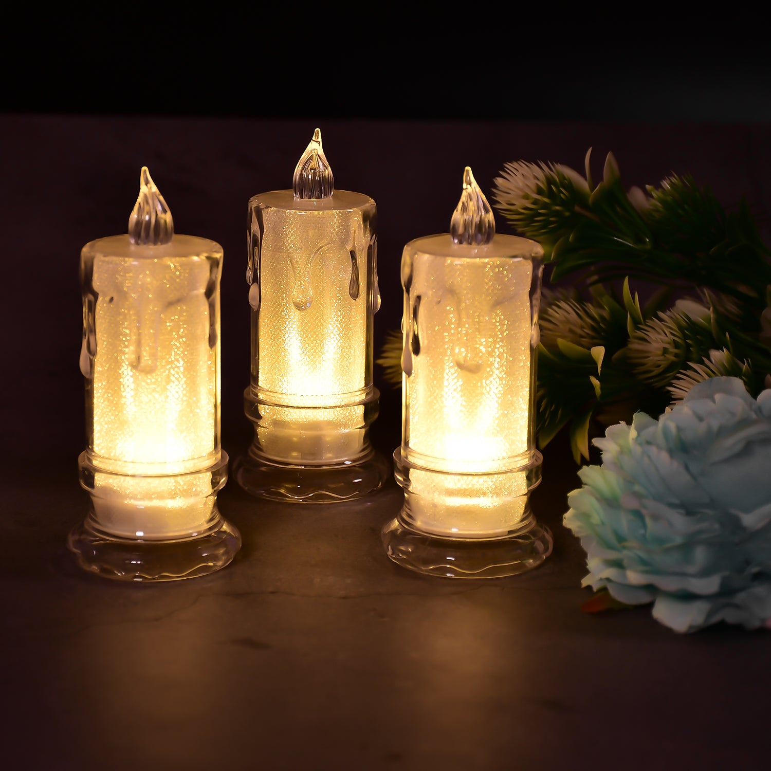 Set of 12 Wukusy flameless melted design candles for home decor, featuring large size and decorative melted wax appearance.
