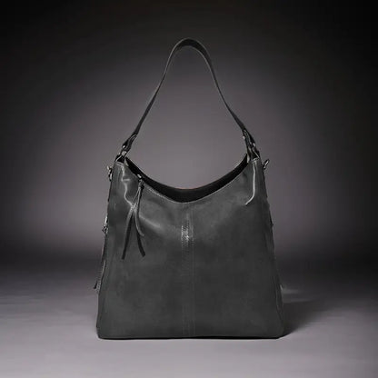 Black vegan leather shoulder bag for camping and hiking, spacious, water-resistant, lightweight, with adjustable strap.