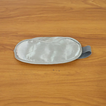Soft Wukusy sleep eye mask, comfortable and plush, designed to block light for restful sleep in a natural, relaxed position.