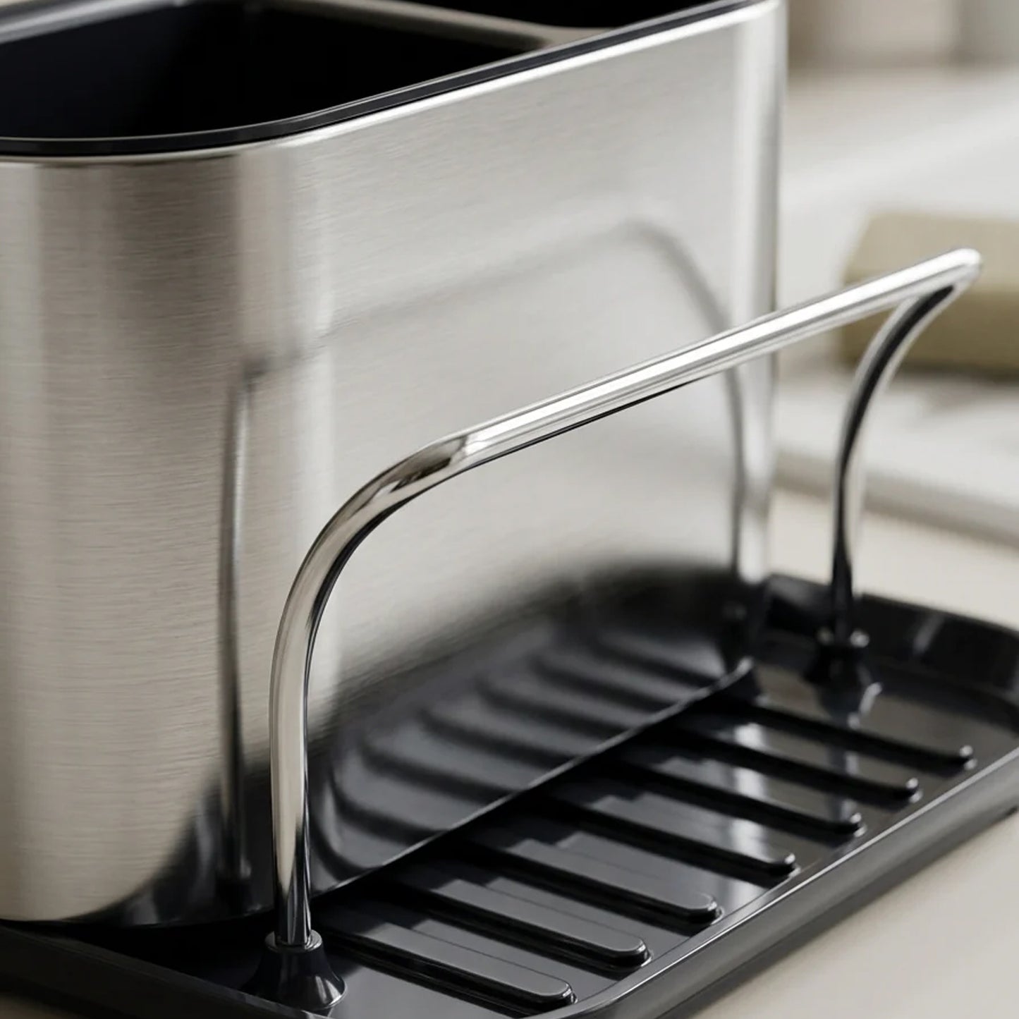 Stainless steel sink caddy organizer rack holder for kitchen sponge storage, designed by Wukusy.