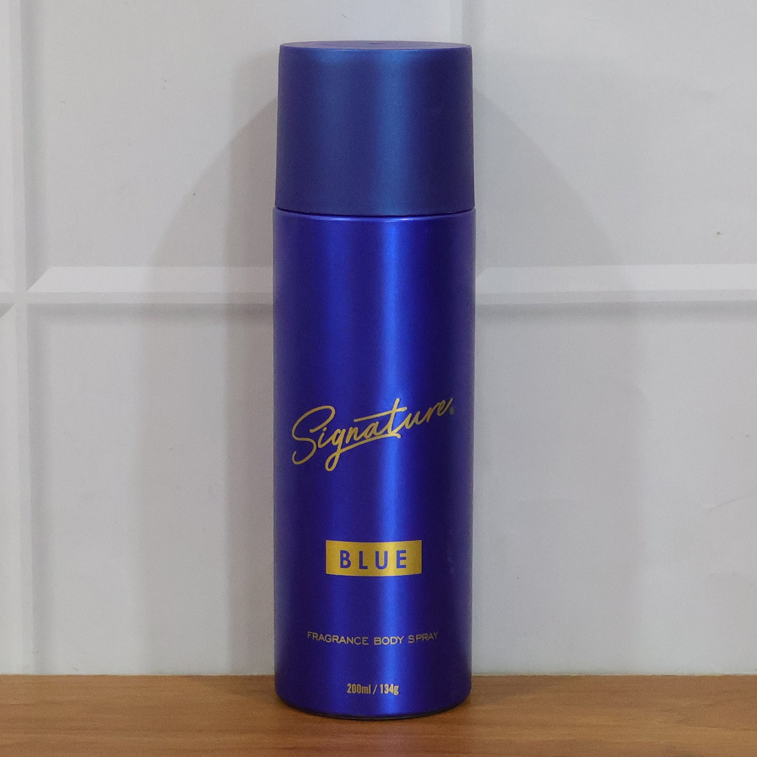 Wukusy Signature Premium Blue Fragrance Body Spray 200ml bottle with sleek design and blue accents.