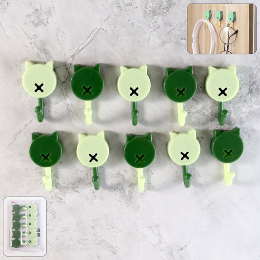 Set of 10 Wukusy self-adhesive round wall hooks for home improvement, shown attached to a wall for organizing and hanging items.