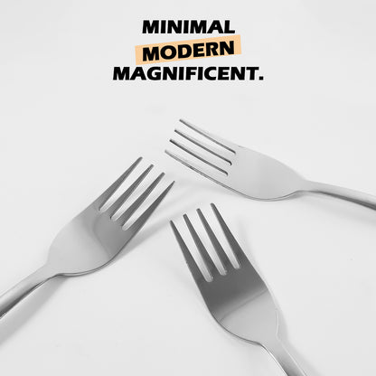 Set of three Wukusy premium stainless steel dinner forks for home and kitchen use, featuring polished handles and four tined design.