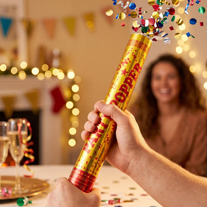 Golden party popper confetti cannon from Wukusy, ready for birthday celebrations and festive events, with colorful confetti inside
