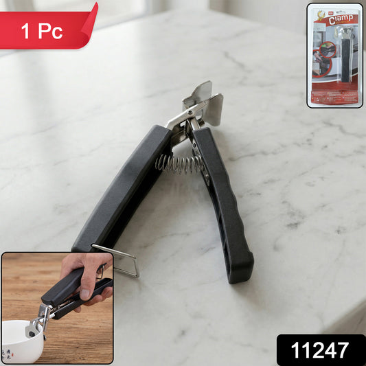 Heavy duty Wukusy universal pot and pan gripper clamp holding cookware securely in a kitchen setting.