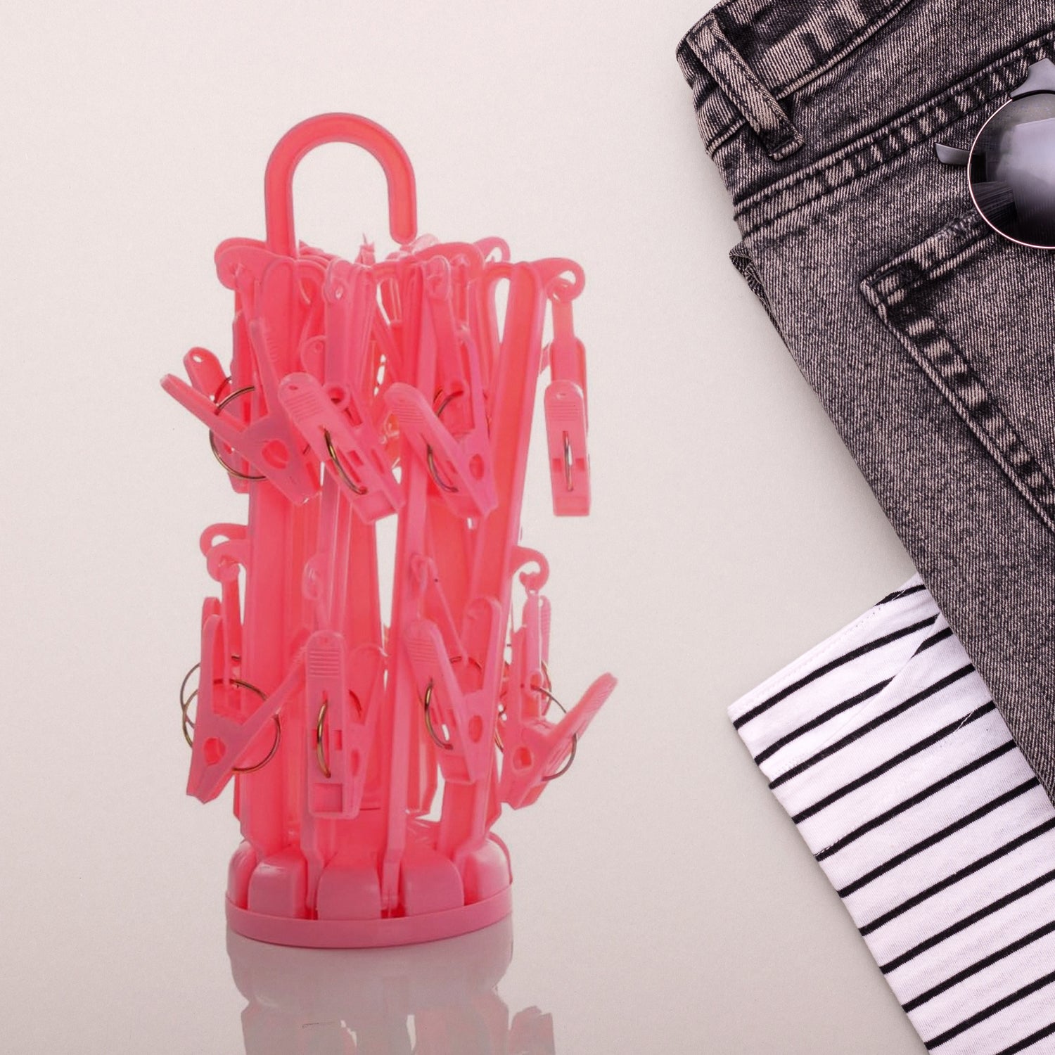 Wukusy plastic foldable underwear drying rack with 16 clips, ideal for drying socks, bras, underwear, and baby clothes.