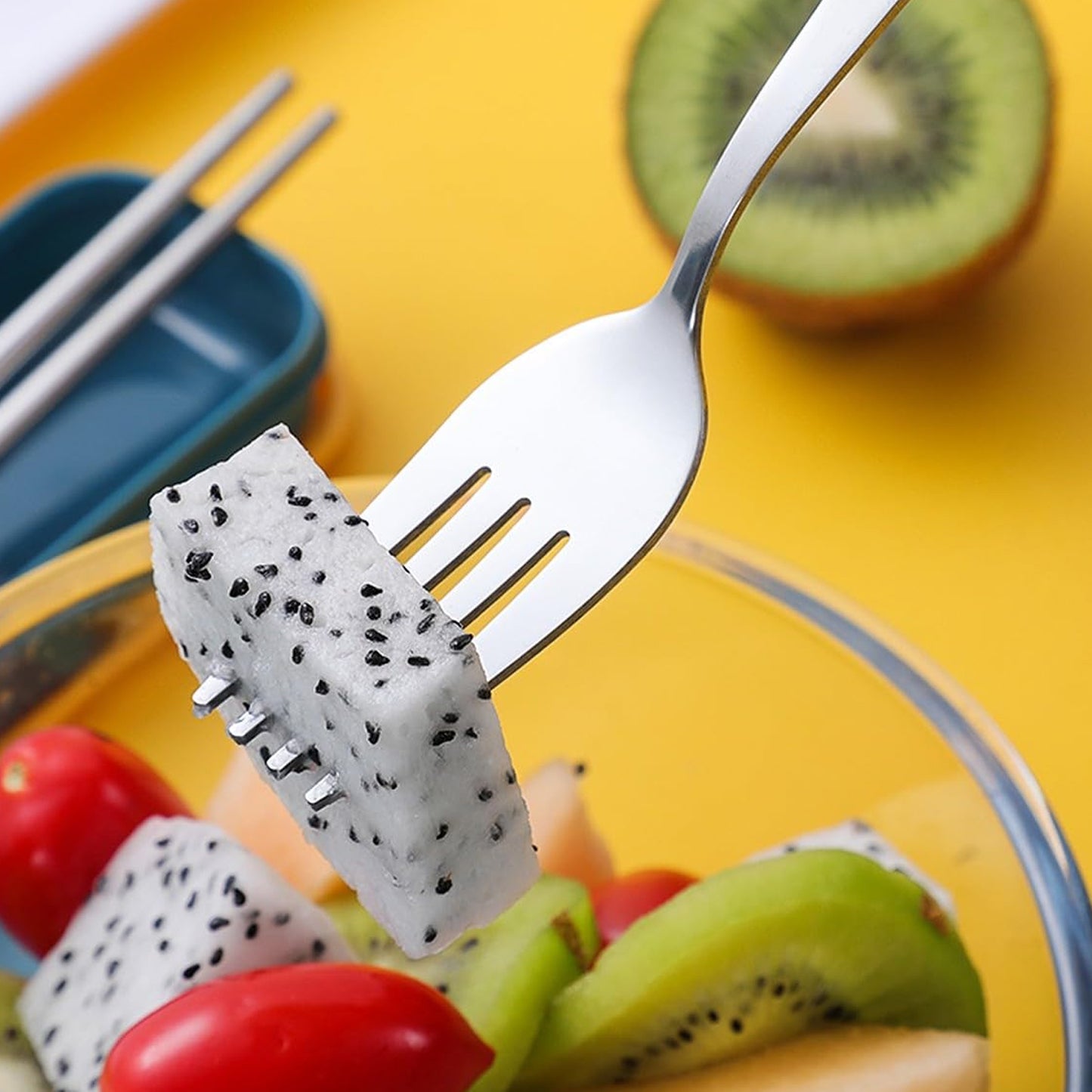 Wukusy stainless steel portable cutlery set with spoon, fork, chopsticks, and pouch, ideal for travel or outdoor dining.