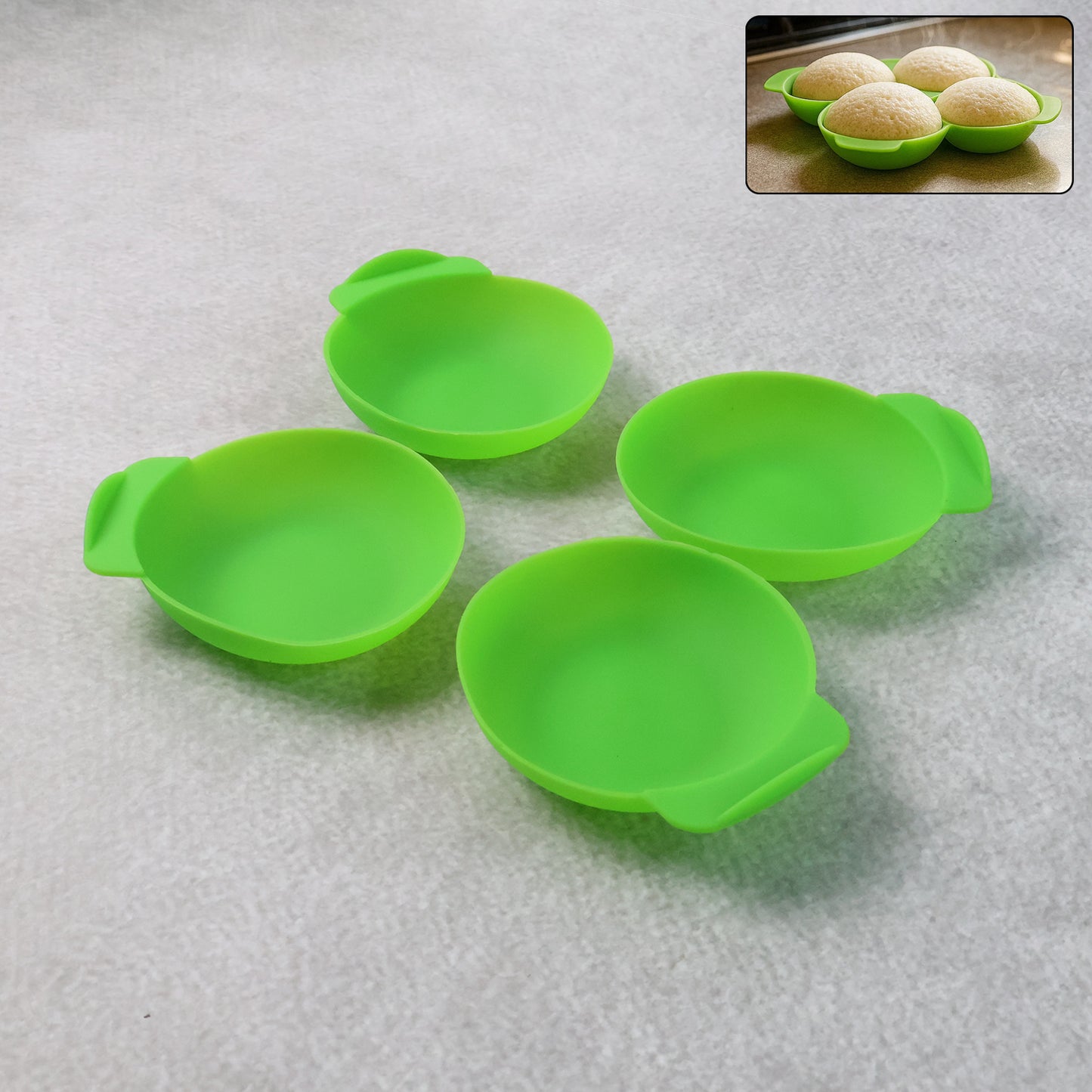Set of four Wukusy food-grade silicone idli maker cups for non-stick idli, dhokla, and egg poaching in home kitchen.