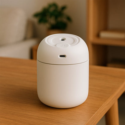 Wukusy portable mini USB humidifier with light, emitting cool mist, ideal for home, office, or travel use.