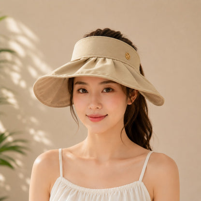 Women’s wide brim sun visor cap by Wukusy with adjustable strap, perfect for summer outdoor wear in a random color.